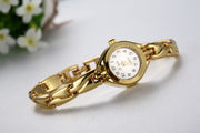 OL Women's Carved Gold Stainless Steel Fashion Watch
