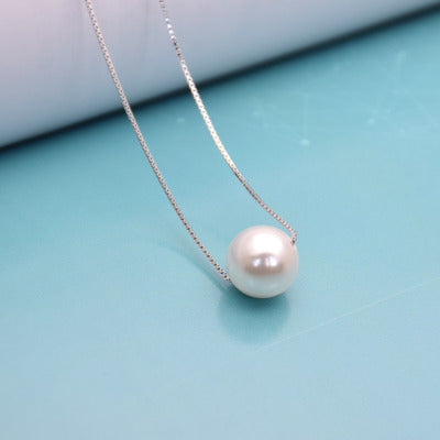 Pearl necklace hanging