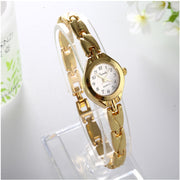 OL Women's Carved Gold Stainless Steel Fashion Watch